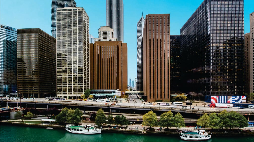 Chicago riverfront skyline with the twin towers of the Hyatt Regency Chicago in Illinois.